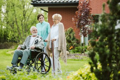 senior-man-on-the-wheelchair-in-the-garden-of-professional-nursing-home.jpg
